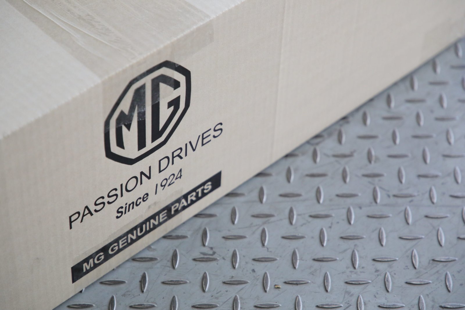 เอ็มจี -